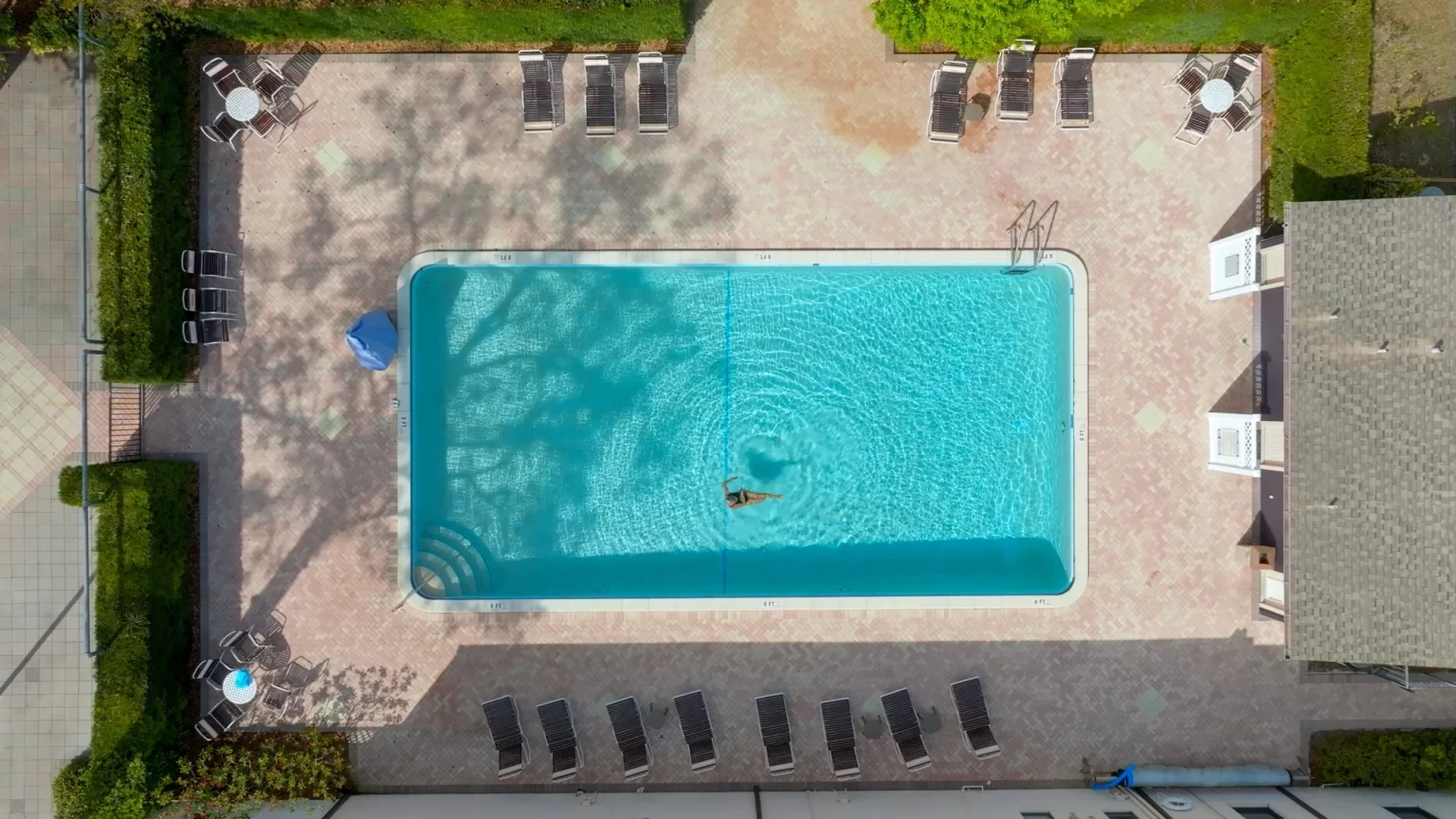 Aerial view of Road Runner Travel Resort’s swimming pool and sun deck